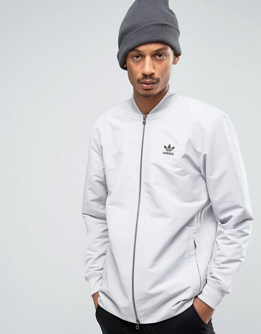WOVEN TRACK TOP